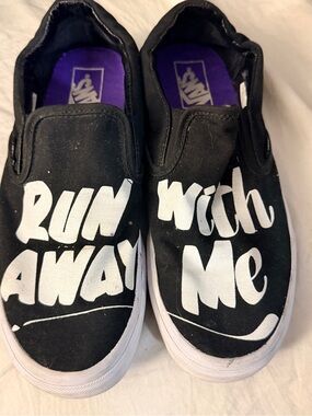 Vans Black Slip-On Sneakers with White Script